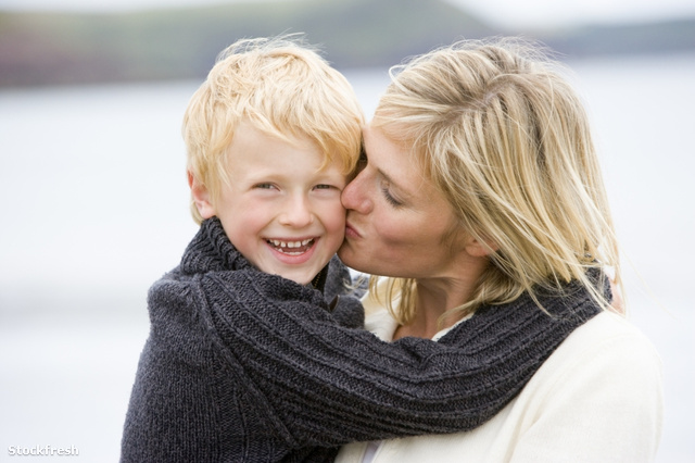 stockfresh 94959 mother-kissing-son-at-beach-smiling sizeS