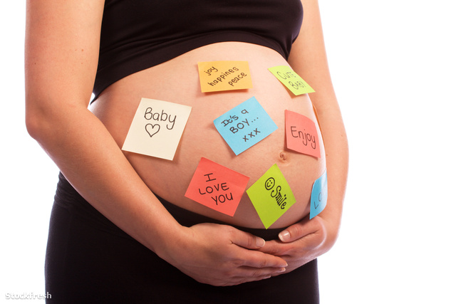 stockfresh 809187 pregnant-caucasian-woman-with-sticky-notes-on-