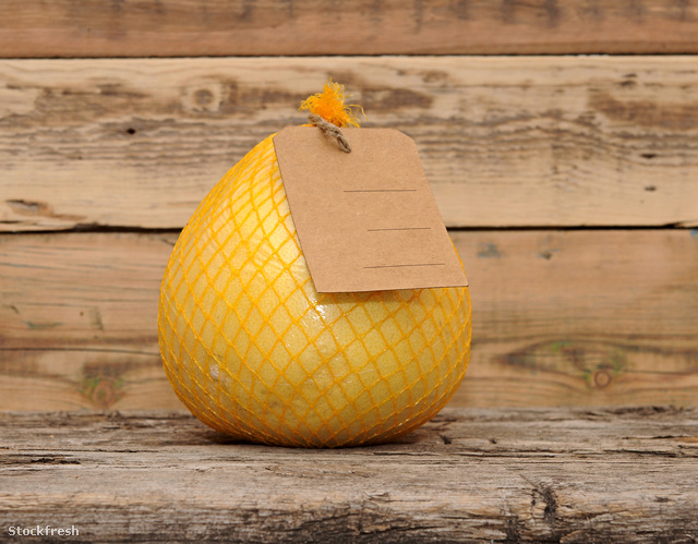 stockfresh 2405854 pomelo-fruit-with-blank-price-tag-wrapped-in-