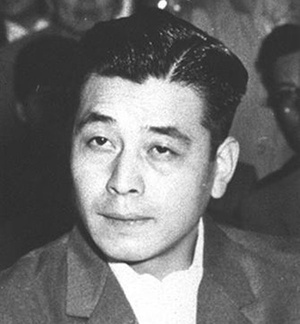 Okunisi Maszaru 1961-ben