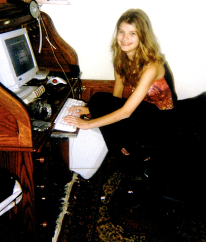 Alicia 13 in front of computer.png