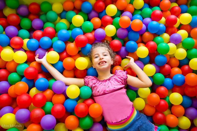 stockfresh 1229947 child-girl-on-colorful-balls-playground-high-