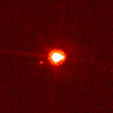 A Hubble Űrteleszkóp 2006-os felvétele az Eris törpebolygóról és Dysnomia nevű holdjáról. [NASA, ESA és M. Brown (California Institute of Technology)]