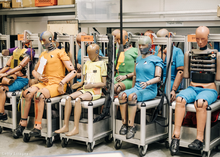 Crash test dummies sit inside the Magna International Inc. Advanced Car Technology Systems safety facility in Sailauf Germany.