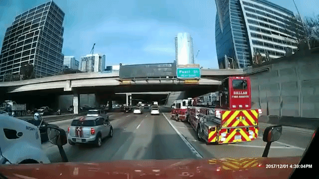 a-dallas-fire-truck-smoothly-drifts-across-four-lanes-of-rush-ho
