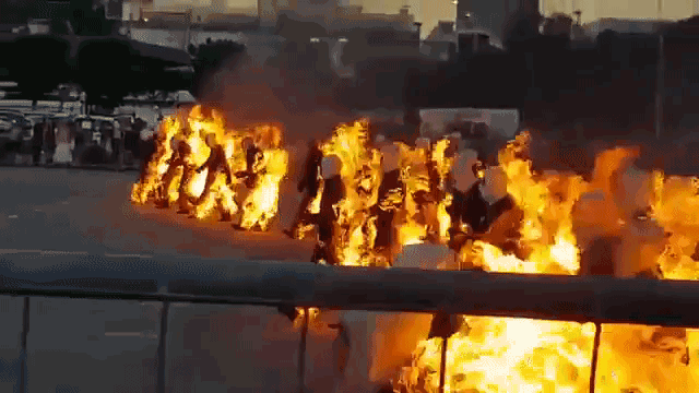 The-Most-people-performing-full-body-burns.gif?w=750
