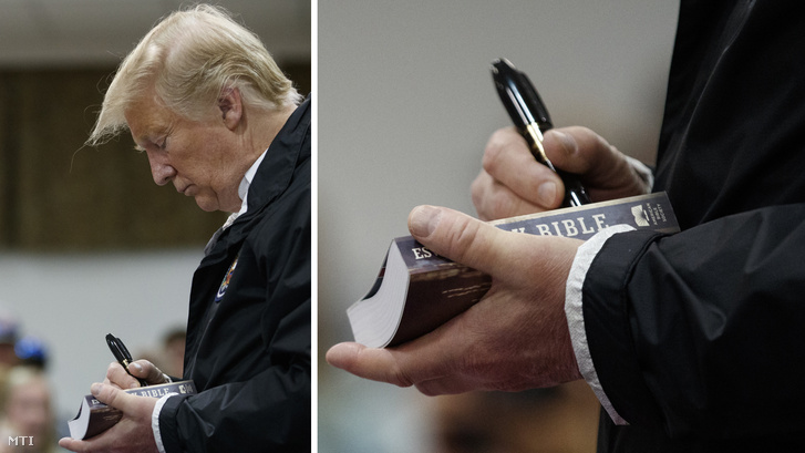 Donald Trump amerikai elnök aláír egy Bibliát, miközben egy baptista templomban kialakított segélyhelyet látogat meg a tornádó sújtotta települések egyikén, az Alabama állambeli Smith Stationben 2019. március 8-án