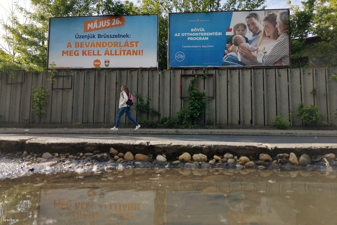 Fidesz poster on the left: "Let's send a message to Brussels: Immigration has to be stopped!" Government poster promoting the family protection plan of action on the right: "The homeowner program is expanding"