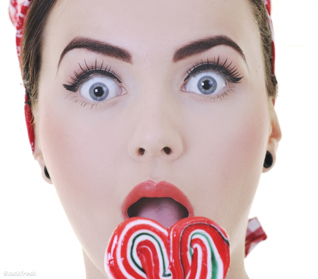 stockfresh 819623 happy-woman-with-lollipop-isolated-on-white si