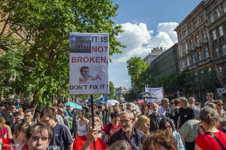 Protesters marching against the law taking away the Academy's research network in Budapest on 2 June 2019
