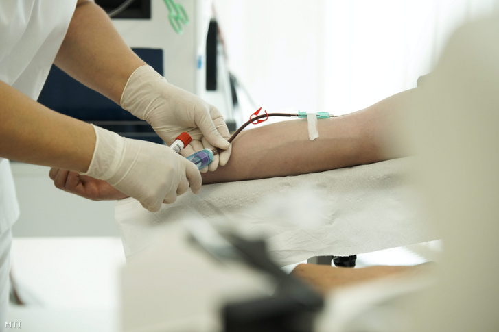 A donor giving blood on the international blood donor day