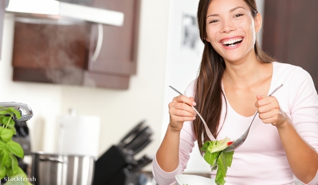 stockfresh 1632349 woman-making-salad-in-kitchen sizeS