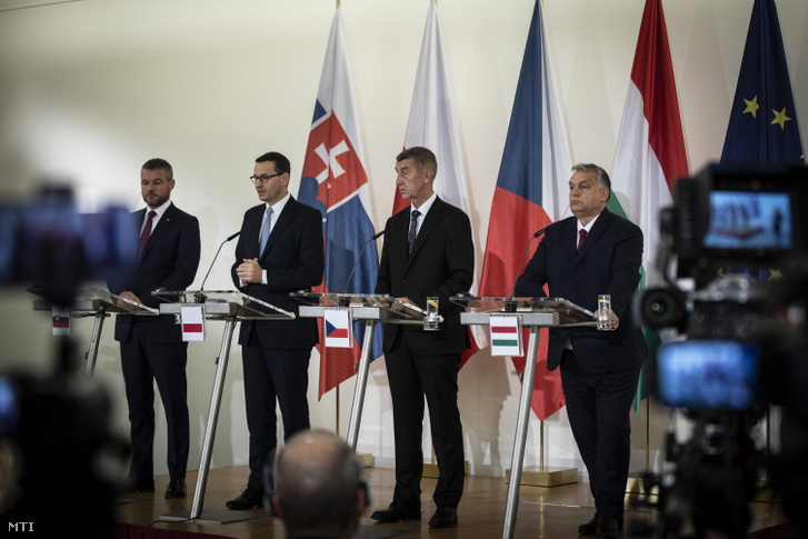 (L-R) Slovakian Prime Minister Peter Pellegrini, Polish Prime Minister Mateusz Morawiecki, Czech Prime Minister Andrej Babis and Hungarian Prime Minister Viktor Orban address a press conference after the Visegrad Group (V4) Meeting on 5 November 2019 in Prague.