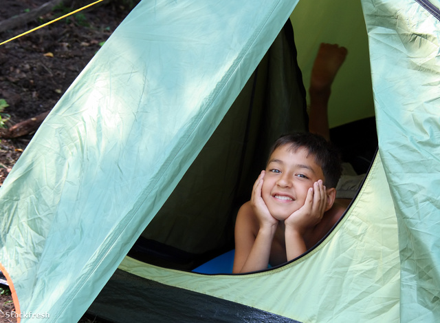 stockfresh 604309 smiling-boy-looking-from-tent sizeM