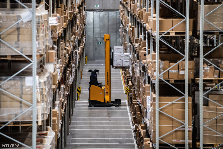 Employee working in a storage facility of a global logistics company near Berlin on 16 April 2020.