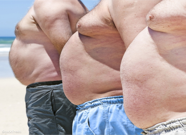 stockfresh 895163 close-up-of-three-obese-fat-men-of-the-beach s