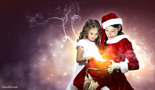 stockfresh 2151571 little-girl-with-christmas-gifts-and-santa si