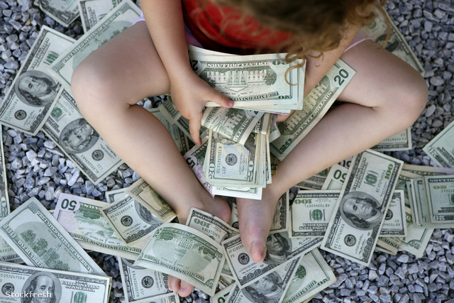 stockfresh 312186 toddler-girl-with-lots-of-dollar-notes sizeM