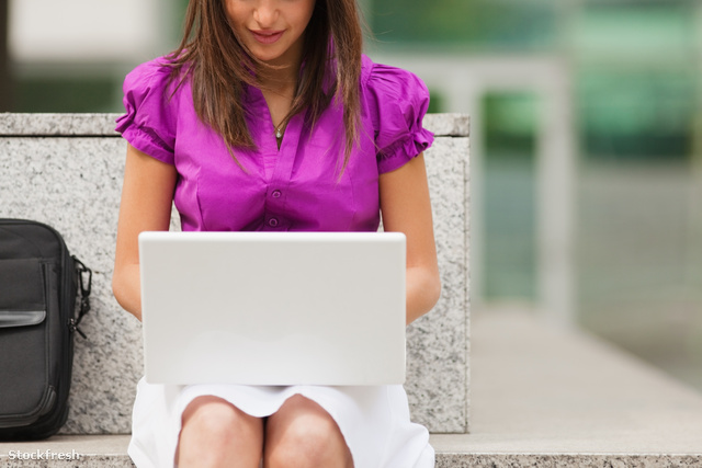 stockfresh 433921 businesswoman-using-laptop-outdoors sizeM