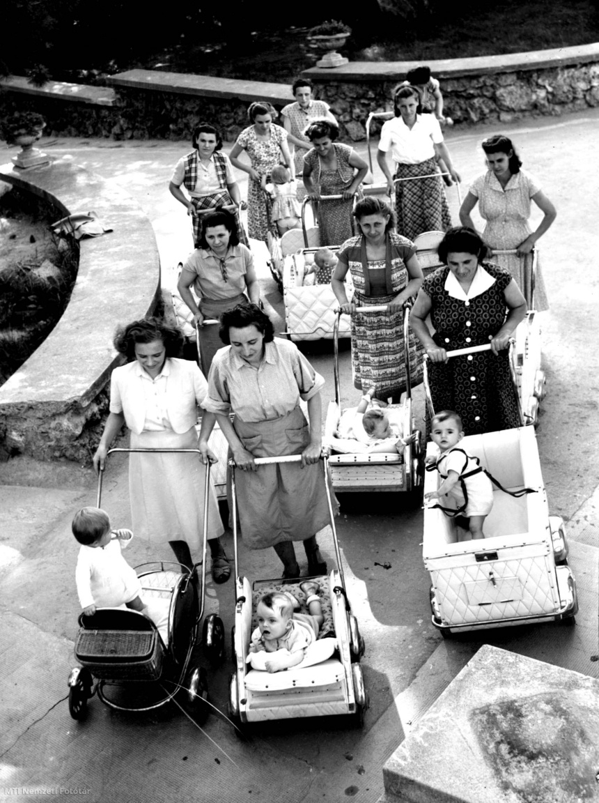 Eger, June 23, 1952 After work, mothers push their children home from the nursery in a stroller