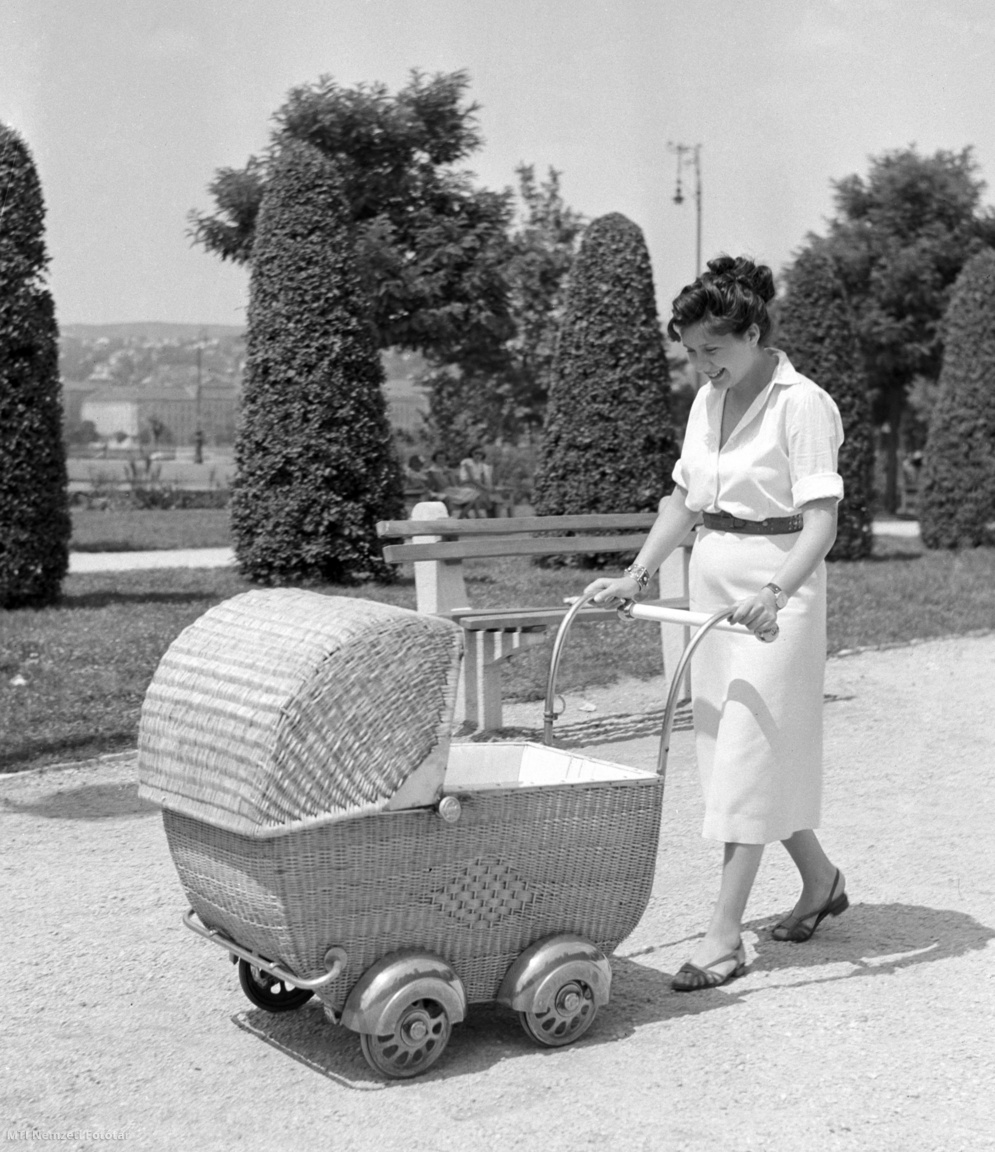 Budapest, July 27, 1953 Actress Eva Rudkoy walks her newborn baby Julia in a stroller