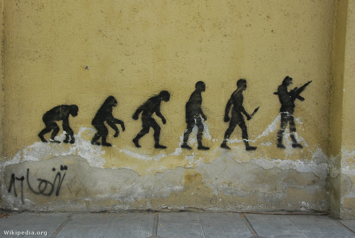 A Fejlődés menete street artként egy teheráni falon