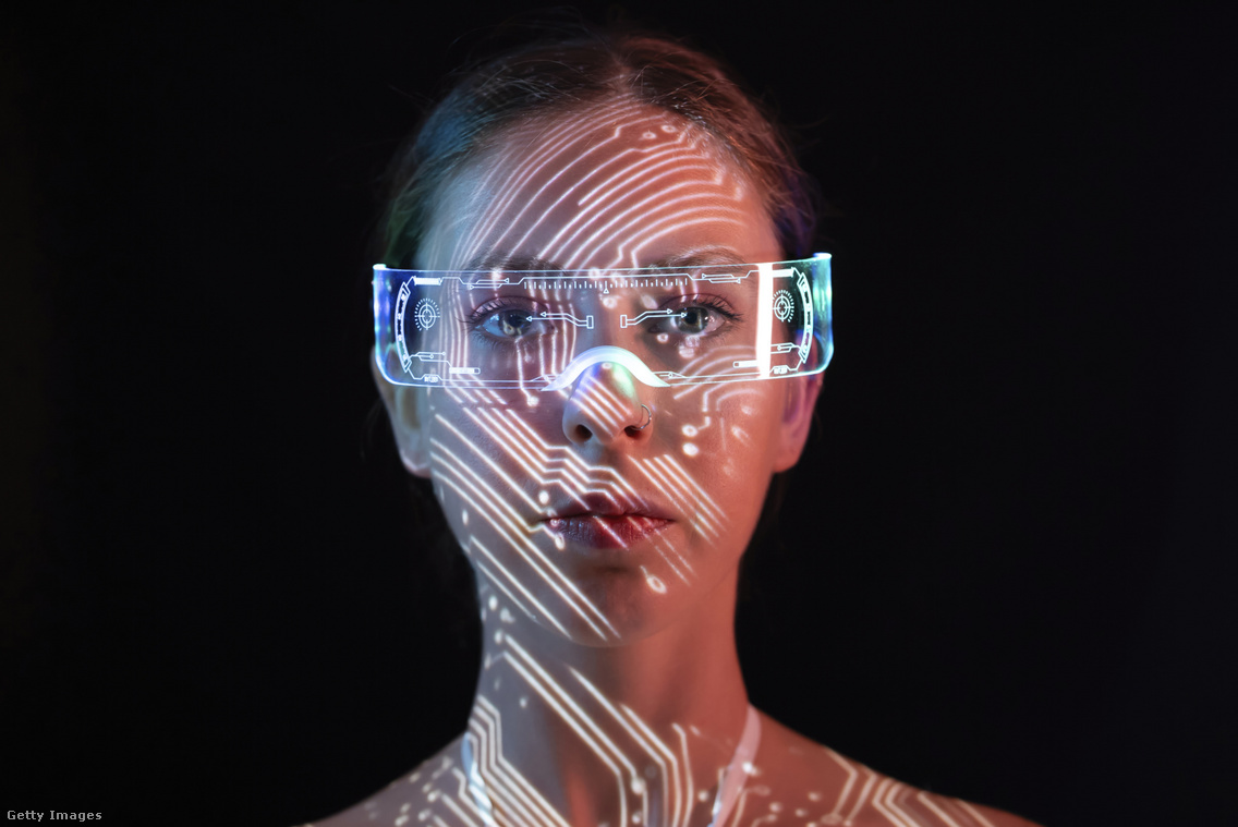 Getty Images Abstract circuit projection on a woman's face