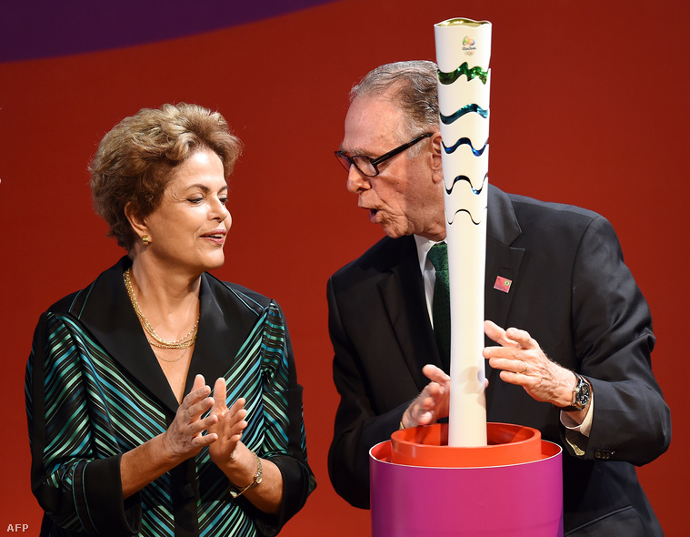Brazilian President Dilma Rousseff (L) and President of the Brazilian Olympic Committee Carlos Arthur Nuzman talk during the presentation of the Rio 2016 Olympic torch